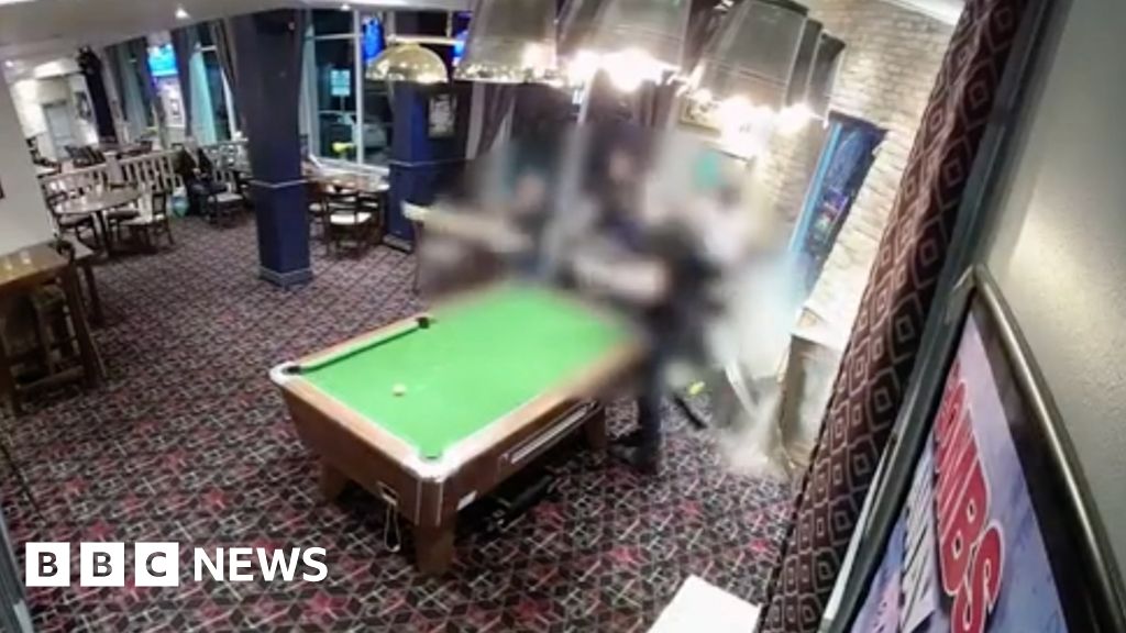 Watch: Cool pool player pots black as car ploughs into pub