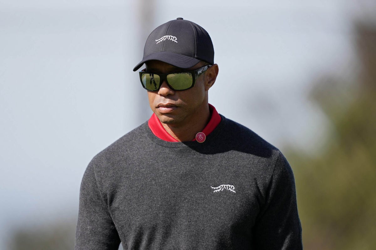 Tiger Woods says he’s recovering after surgery to repair a ruptured Achilles