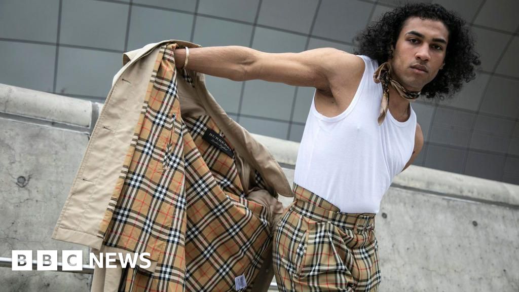 Burberry to cut 1,700 jobs as designer suffers heavy losses