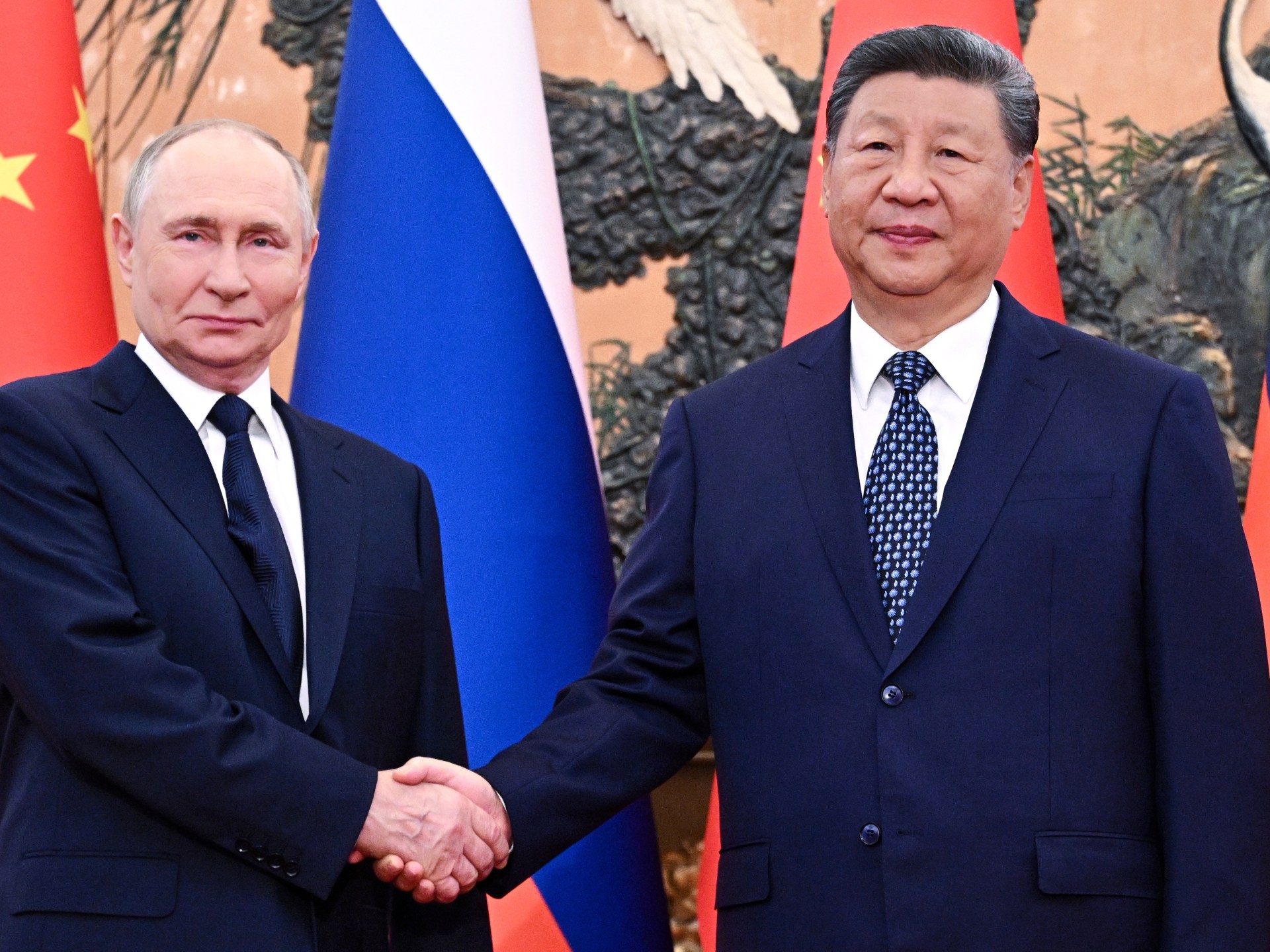 Xi welcomes ‘old friend’ Putin who lauds ‘unprecedented’ ties in Beijing | Business and Economy News