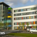 Portsmouth surgeon who 'stripped naked in cubicle' struck off